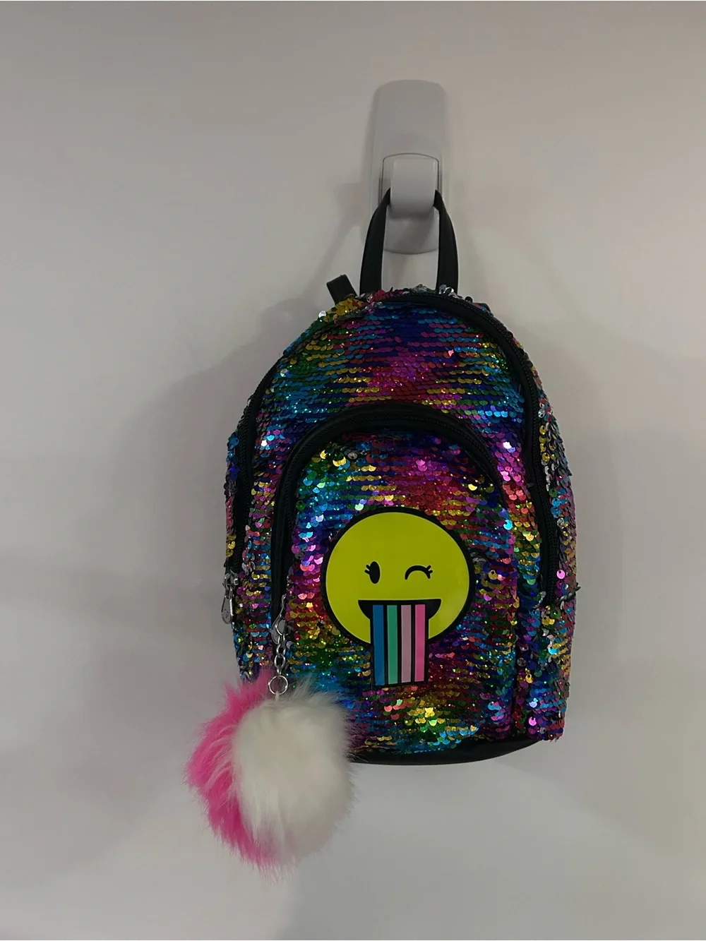 Justice Rainbow Sequin Backpack with Yellow Emoji and Pink Pom